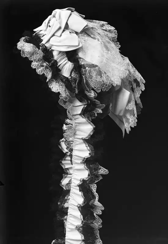The Complete History of Hats: How Headwear Shaped Fashion and Culture Through the Ages 15 18th-century women's bonnet made of lace and tulle with ribbons, from the Nordiska Museet collection, Sweden