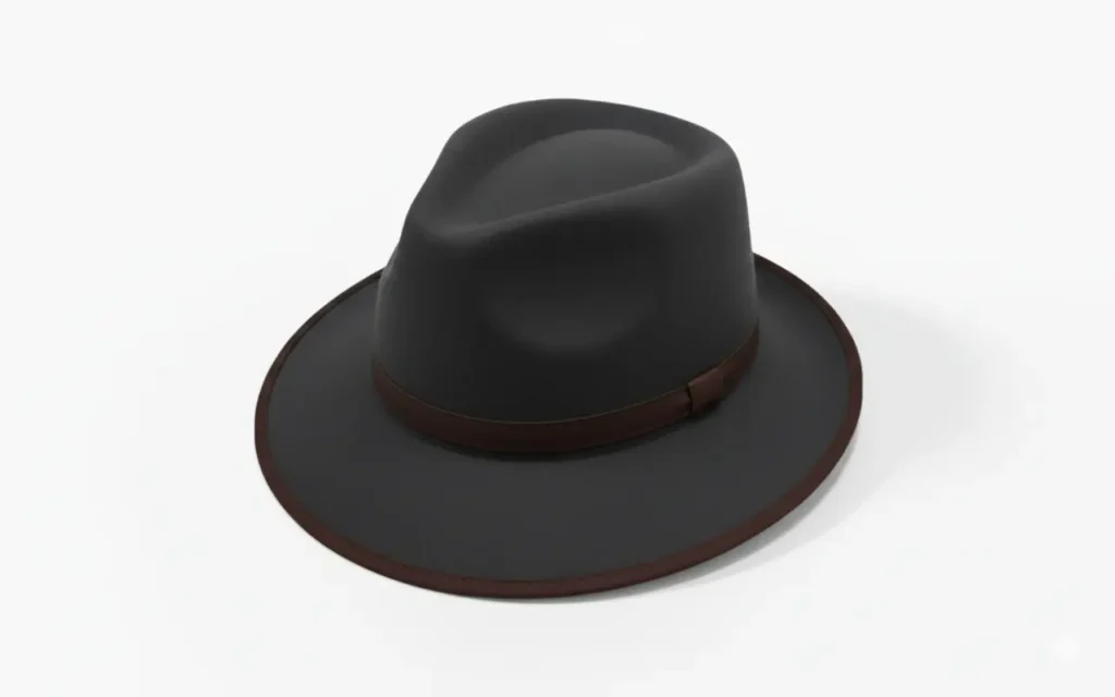 Classic felt fedora hat in neutral color showing structured crown, front pinch, center dent, lateral dimples, and soft brim.