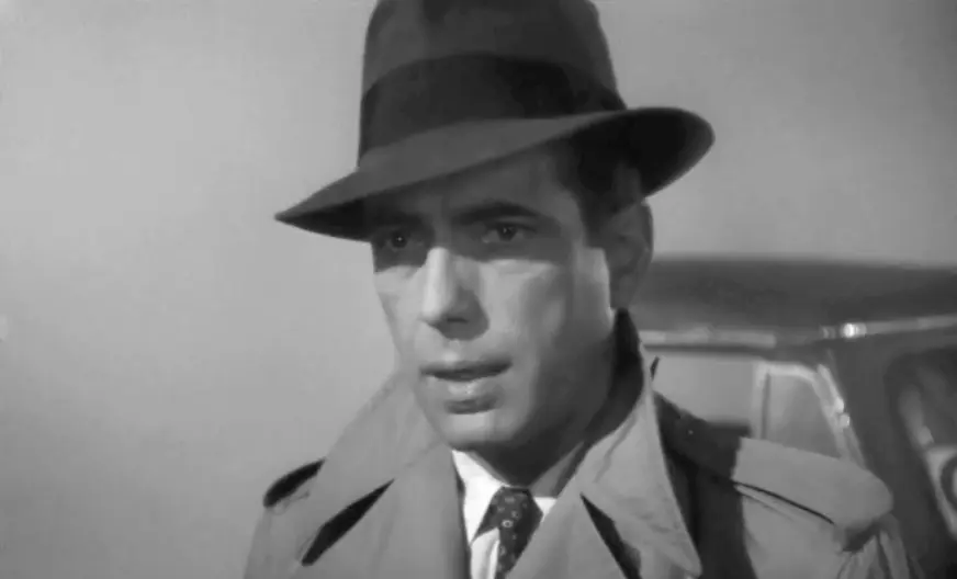 Humphrey Bogart wearing a classic fedora hat in the 1942 film Casablanca