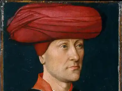 Portrait of a man wearing a red chaperon, a popular medieval hat in the 15th century.