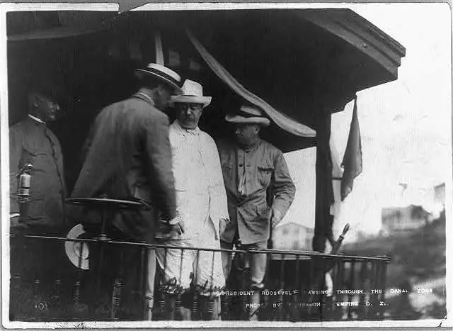 President Theodore Roosevelt standing at the Panama Canal construction site in 1906, wearing a toquilla straw hat, known today as a Panama hat.