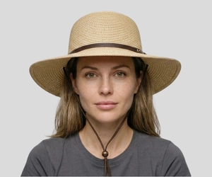 Woman wearing wide brim sun hat with diamond-shaped face