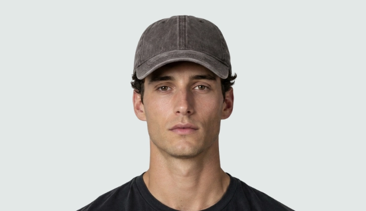 Man with oblong face wearing gray washed baseball cap