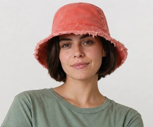 Best Summer Hats for Women With Short Hair 6 Woman with short hair wearing a cotton bucket hat