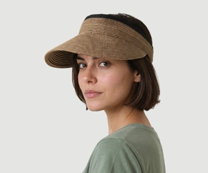 Best Summer Hats for Women With Short Hair 7 Woman with short hair wearing a straw sun visor hat