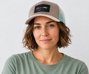 Best Summer Hats for Women With Short Hair 4 Woman with short hair wearing a trucker hat