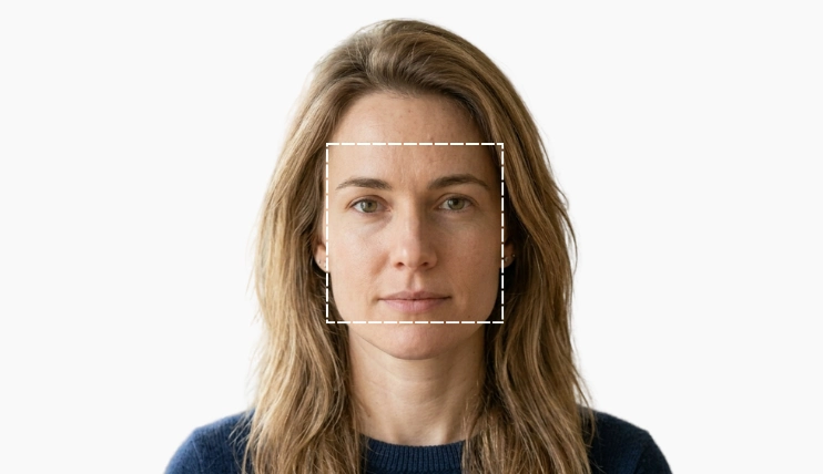A visual guide illustrating what is a square face shape, featuring a woman with a dashed white square overlaying her facial features to highlight the balanced forehead and jawline proportions.