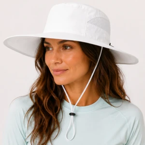 Woman wearing Connectyle white wide brim sun hat with adjustable chin strap